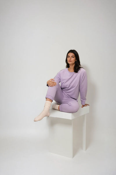 Relax in comfort and style with the Marnie Everyday Jogger. Made from soft terry cotton, these joggers are perfect for lounging, sleeping, or casual outings. The cuffless style offer a versatile fit, allowing you to roll them up for a more personalized look. Featuring an elasticated waistband with a cord tie, the joggers provide a relaxed yet secure fit.