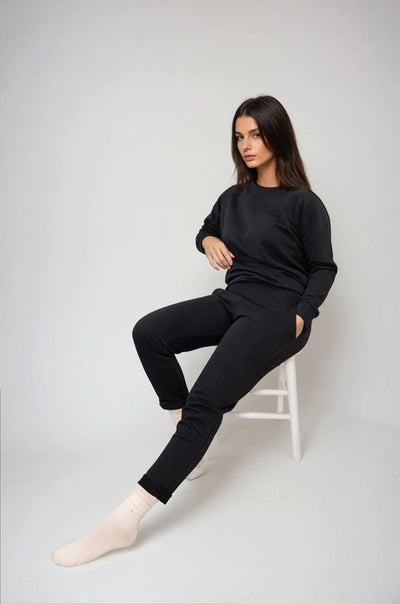 Relax in comfort and style with the Marnie Everyday Jogger. Made from soft terry cotton, these joggers are perfect for lounging, sleeping, or casual outings. The cuffless style offer a versatile fit, allowing you to roll them up for a more personalized look. Featuring an elasticated waistband with a cord tie, the joggers provide a relaxed yet secure fit.