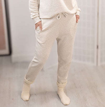 Relax in comfort and style with the Marnie Everyday Jogger. Made from soft terry cotton, these joggers are perfect for lounging, sleeping, or casual outings. The cuffless style offer a versatile fit, allowing you to roll them up for a more personalized look. Featuring an elasticated waistband with a cord tie, the joggers provide a relaxed yet secure fit.

The matching Marnie Everyday Sweatshirt boasts a slight scoop neckline and it sits perfectly just at the hips, ensuring a flattering fit. Available in siz