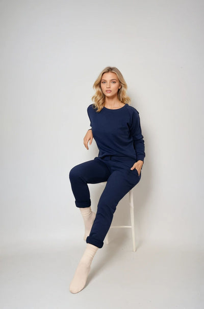 Relax in comfort and style with the Marnie Everyday Jogger. Made from soft terry cotton, these joggers are perfect for lounging, sleeping, or casual outings. The cuffless style offer a versatile fit, allowing you to roll them up for a more personalized look. Featuring an elasticated waistband with a cord tie, the joggers provide a relaxed yet secure fit.